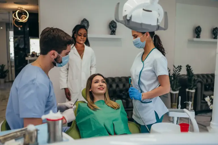 woman patient in dental clinic being examined by a 2023 11 27 05 09 59 utc