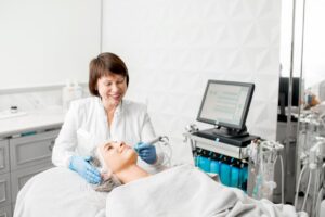 senior woman cosmetologist during the procedure 2025 03 15 18 43 21 utc